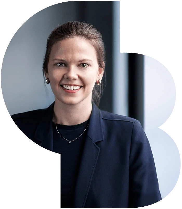 A satisfied and confident female employee smiling for the camera 