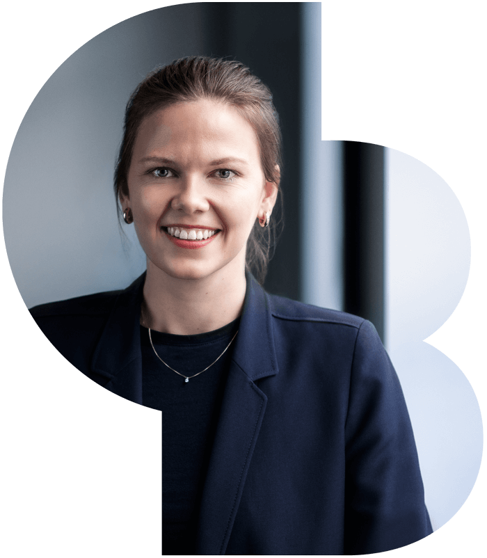 A satisfied and confident female employee smiling for the camera 